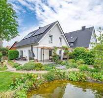 Einziehen und wohlfühlen - modernes Einfamilienhaus mit traumhaft schönem Garten in beliebter Lage von Halle (Westf.) - Halle (Westfalen) Hesseln