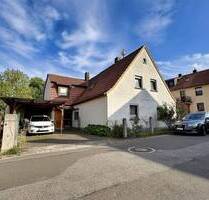 Wohnen & Vermieten: Charmantes Zweifamilienhaus mit Garten - Knetzgau
