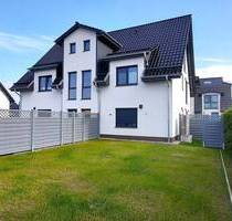 +++PROVISIONSFREI+++Super schöne und exklusiv ausgestattete Eigentumswohnung mit Terrasse und großem Gartenanteil im Ostseebad Zingst