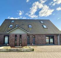 Neubaugleiche, hochwertige Tiefparterre-Wohnung mit Terrasse und Außenstellplatz Kiel-Russee