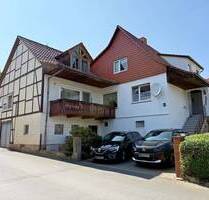Ihr neues Zweifamilienhaus mit Garagen, Balkon und Wintergarten in Spangenberg-Pfieffe