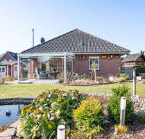Junges und sehr gepflegtes Haus mit Garage, Wintergarten und Gartenhaus auf wunderbar angelegtem Grundstück - ein Traum für Familien - Jübek