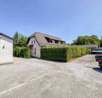 Faktor: 10 mit 6-Familienhaus + ca. 200m² Werkstatt, Garage & 9 Stellplätze - mitten in Unna-City!