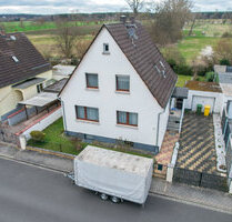 DIETZ: Modernisierungsbedürftiges Einfamilienhaus mit Garten in direkter Feldrandlage von Rollwald! - Rodgau