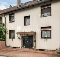 Zweifamilienhaus mit 210 m² Wohnfläche, Wintergärten, Loggia und gepflegtem Gartenparadies - Langenselbold