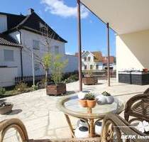 BERK Immobilien - Charmante 2-Zimmer-ETW mit großzügiger Terrasse, Garten, Garage + Dachboden - Stockstadt am Main