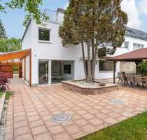 Aigner - Seltene Gelegenheit: Reiheneckhaus mit modernem Anbau & grossem Garten in Taufkirchen