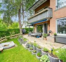 AIGNER - Charmante Doppelhaushälfte mit Gartenidylle in Pöcking