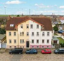 Investieren und gestalten: MFH in Lützen mit 3 Wohnungen, Garten, Garage und großzügigem Grundstück