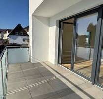 TOP Lage - 3-Zimmer, Küche, Bad, Gäste-WC, Abstellraum und Balkon in Baunatal A+ Energieeffizienz - KFW 55 - & Erstbezug -