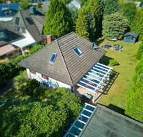 Walmdachbungalow mit Doppelgarage & Baupotential auf Traumgrundstück in Jesteburg
