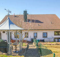 Klassisches Einfamilienhaus mit Einliegerwohnung, Doppelgarage und großem Garten in Altertheim