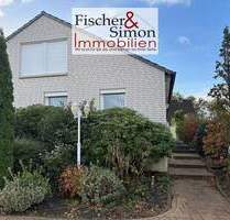 RESERVIERT-ebenerdiges, sehr gepflegtes Einfamilienhaus mit wohnlich ausgebautem DG und Wintergarten - Nienburg (Weser)