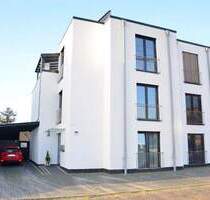 Außergewöhnliches Zweifamilienhaus mit Lift unterteilt in eine Penthouse- Wohnung über 2 Etagen sowie einer Erdgeschosswohnung in Rastede Zentrum