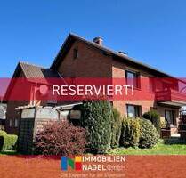 Solides Zweifamilienhaus mit Gartenidylle in Löhne-Mennighüffen!