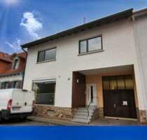 Mitten in Walldorf: Familienfreundliches Haus mit idyllischem Innenhof und Garten