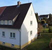 1 o. 2-Familiendoppelhaushälfte mit großem Potenzial und idyllischem Grundstück in Niestetal-Sandershausen