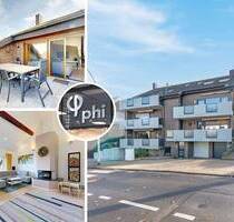 PHI AACHEN - Stilvolle Split-Level-Wohnung mit Terrasse und Garage in ruhiger Lage von Würselen!
