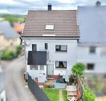 Einziehen & Wohlfühlen: Doppelhaushälfte mit Gartengrundstück in Mengerskirchen