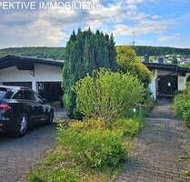 Solides Ein- bis Zweifamilienhaus mit Blick über Bad König