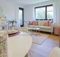 Charmante 4-Zimmerwohnung im ersten Obergeschoss mit Balkon und Gartenanteil - Dittelbrunn Hambach