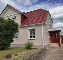 Doppelhaushälfte mit Garten und Garage in Tribsees