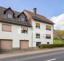Modernisiertes MFH mit vier Wohneinheiten, großem Garten und drei Garagen - Großalmerode Trubenhausen