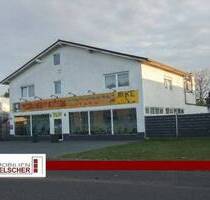 Vielseitige Gewerbeimmobilie mit Betriebswohnung, Werkstatt und Erweiterungspotential - Übach-Palenberg / Holthausen