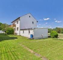 Einfamilienhaus mit herrlich großem Gartengrundstück und zwei großen Garagen - Lenting