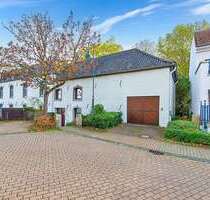 PHI AACHEN - Raumwunder mit großzügigem Süd-Garten und Garage im Herzen von Laurensberg!