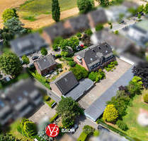 Vollvermietetes Immobilien-Ensemble mit großem Garagenhof in absoluter Top-Wohnlage von MB-Büderich - Meerbusch