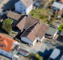 2 Wohneinheiten (WEG geteilt) im Bungalowstil zusammenhängend mit großer Wohnfläche - Rüsselsheim / Bauschheim Alt-Bauschheim Ortsmitte