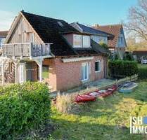 Einfamilienhaus mit Einliegerwohnung und Blick in die Schwingewiesen - Stade Übriges Stade