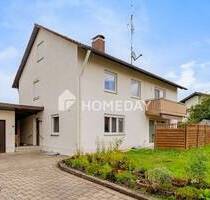 Familienfreundliches EFH mit großzügiger Südost-Terrasse, Garten und zwei Garagen - Fellheim