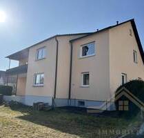 Charmantes Einfamilienhaus mit 3 Garagen und herrlichem Grundstück in Hallerndorf
