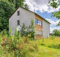 Sanierungsbedürftiges Einfamilienhaus auf weitläufigem Grundstück in Gerolsbach