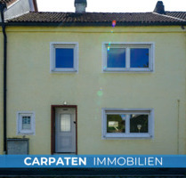 Reihenmittelhaus mit Einbauküche, Terrasse, Keller & 3 Garagen in 84140 Gangkofen kaufen