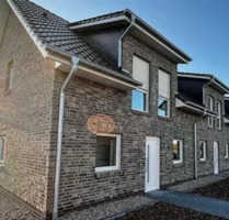 Exclusives Reihenmittelhaus - Ostrhauderfehn - Neubau - Erstbezug - Wärmepumpe - Zentrale Lage