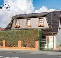 Zentral gelegenes Haus mit lichtdurchflutetem Wintergarten in Ellerbek!