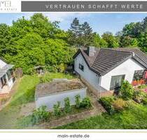 Zwei gepflegte Einfamilienhäuser mit Garage, Stellfläche und großzügigem Garten in Neu-Isenburg