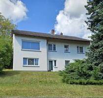 Familienfreundliches Einfamilienhaus mit Doppelgarage und ELW in ruhiger Lage zu verkaufen - Rimpar
