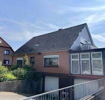 Vollunterkellertes Einfamilienhaus mit vermieteter Einliegerwohnung und viel Potential - Zarpen