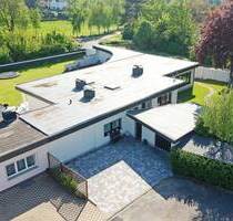 Provisionsfrei! Modernisierter Flachdachbungalow mit großem Garten in Erftstadt-Friesheim