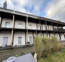 Investmentchance: Mehrfamilienhaus mit 14 Einheiten & Wohngrundstück für Neubau bei Leverkusen