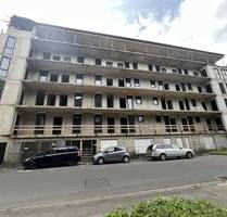 Großzügiges Mehrfamilienhaus mit einer Mittelgarage im Rohbau in Wuppertal