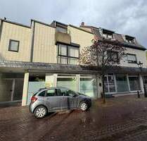 Großzügiges Invest, ETW mit vermietetem Ladenlokal in zentraler Lage - Korschenbroich