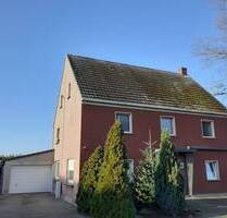 Hamm-Uentrop, ein beindruckendes Haus mit 2 Garagen und sehr großem Garten in Kanalnähe.