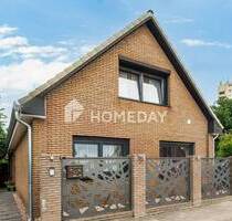 Einfamilienhaus mit zwei Wohneinheiten und großem Grundstück mit Baulandreserve - Delmenhorst Dwoberg/Ströhen