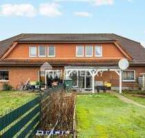 Attraktives Mehrfamilienhaus mit 4 WEs, Garten und Garagen in Bersenbrück