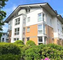 PURNHAGEN-IMMOBILIEN - Oberneuland - gepfl. Eigentumswohnung mit Balkon u. Tiefgarage in ruhiger Lage - Bremen